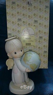 Precious moments 9 Ltd Ed of 2000. He's got the whole world in his hands. NEW