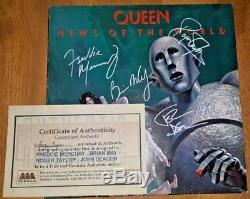 Queen band signed autographed News of the World album LP COA