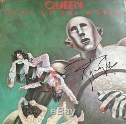 Roger Taylor Queen signed Lp With Proof Of Him Signing The Lp News Of The World